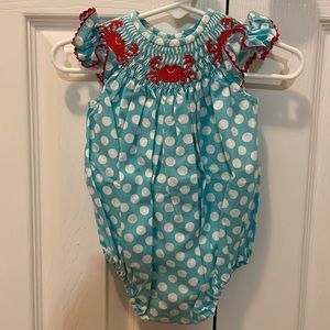 Southern Sunshine Kids polka dot bubble with crab smocking at neckline